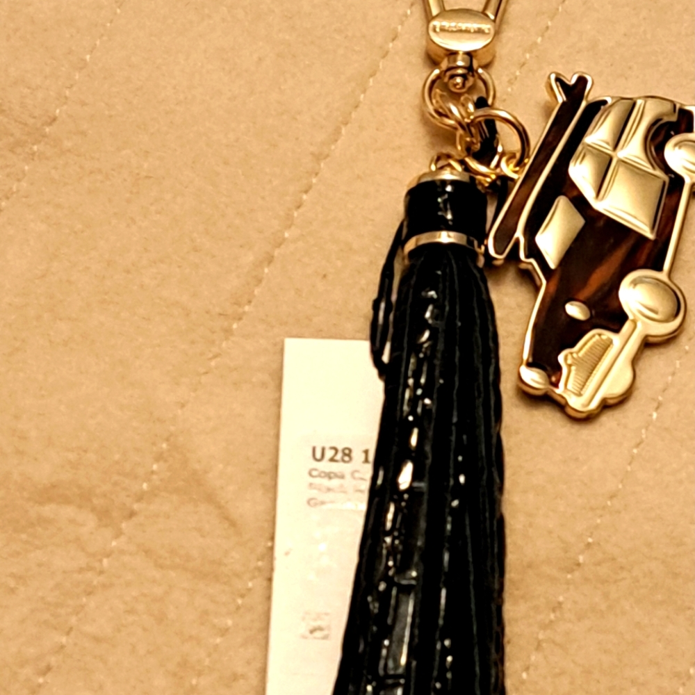 Brand New Black & Pecan Copa Key Fob. Comes From a Smoke & Pet Free Home.